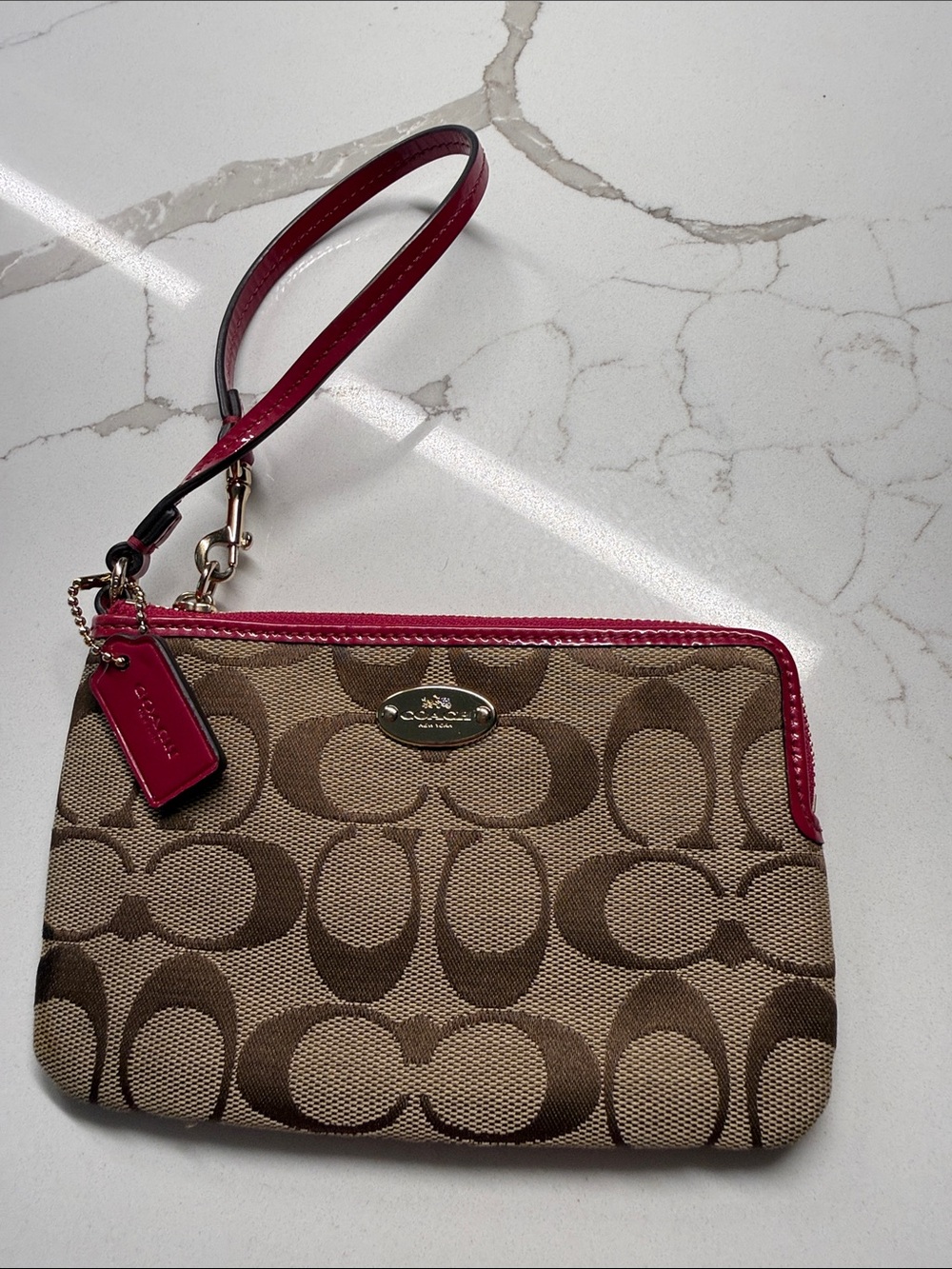 Coach Brown Signature Canvas Wristlet with Pink Trim